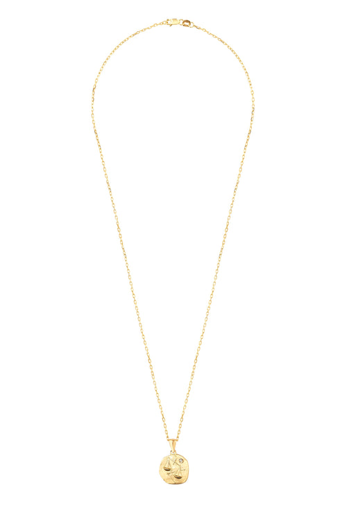 Gold necklace with medallion with the zodiac sign Libra Le Voyage