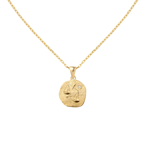 Gold necklace with medallion with the zodiac sign Libra Le Voyage