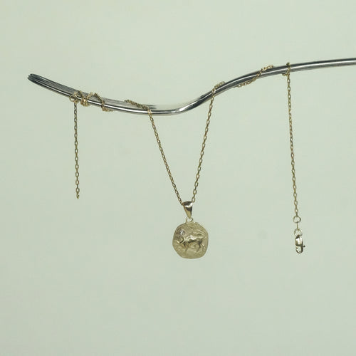 Gold necklace with medallion with the zodiac sign Libra Le Voyage